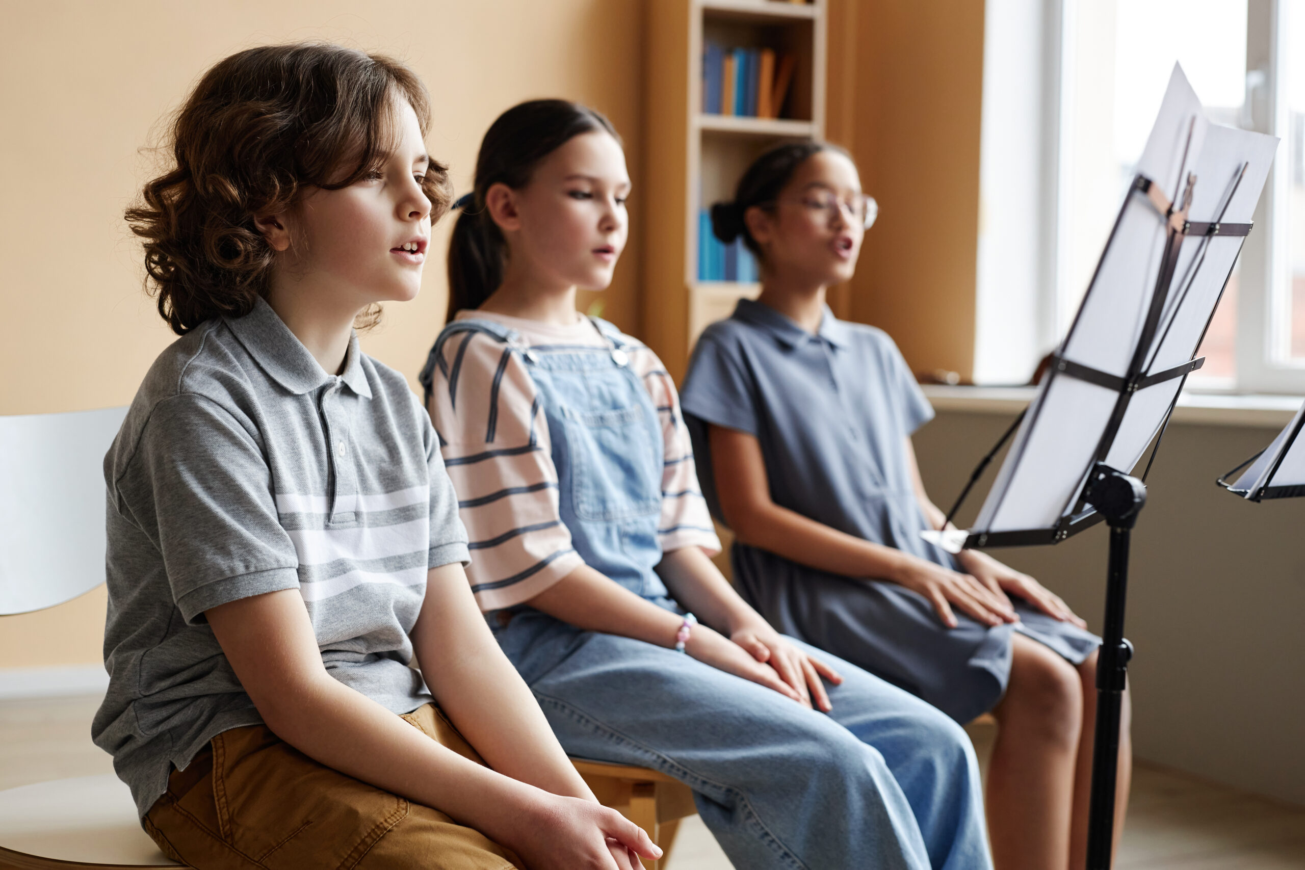 Children singing during music lesson